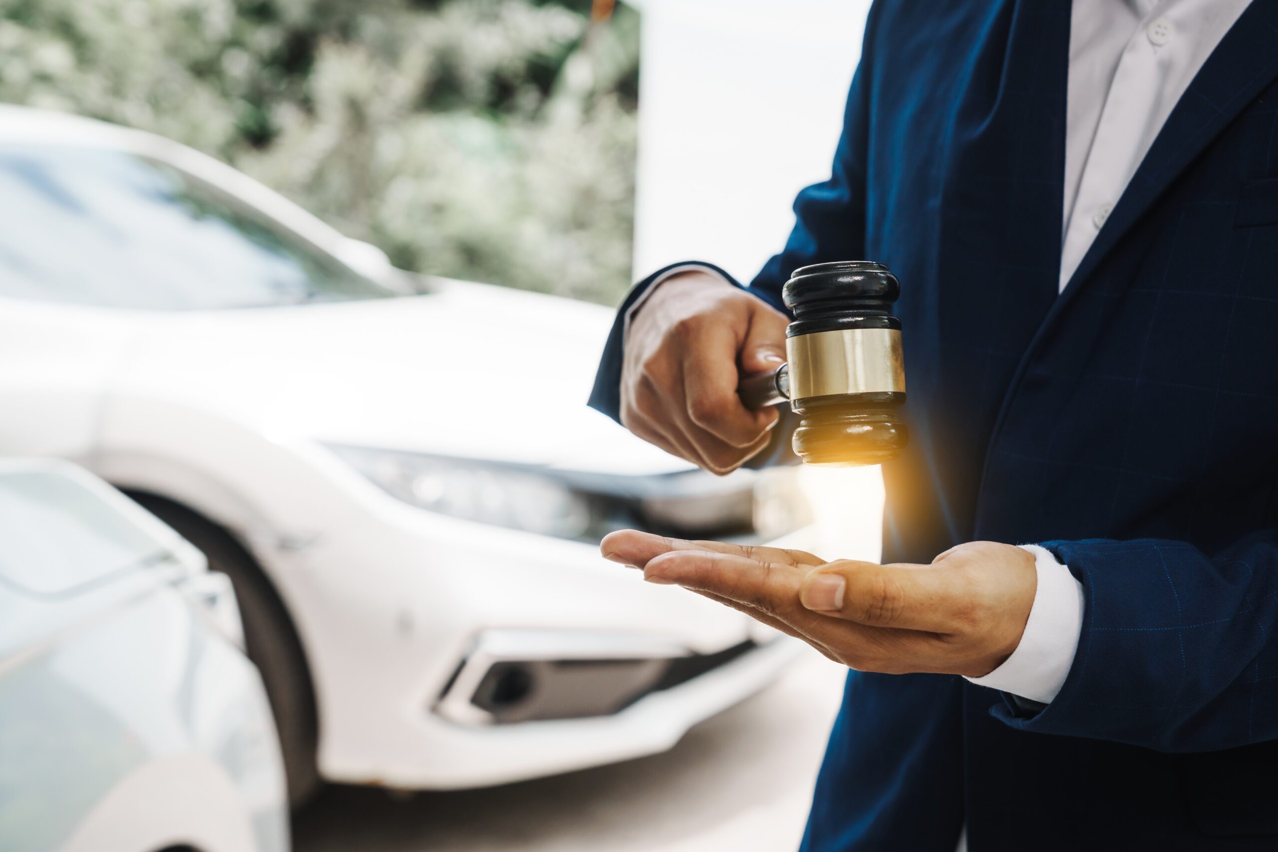Businessman,In,A,Suit,And,A,Lawyer,,Holding,A,Wooden